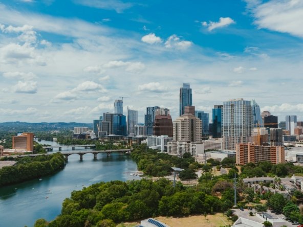 Downtown Austin, Texas skyline along Lady Bird Lake at sunset